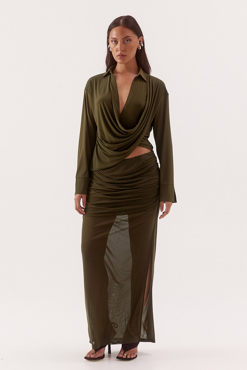 Women's stretch mesh drape front shirt with cowl wrap neckline, dropped shoulders, two-piece collar and wide split cuffs.