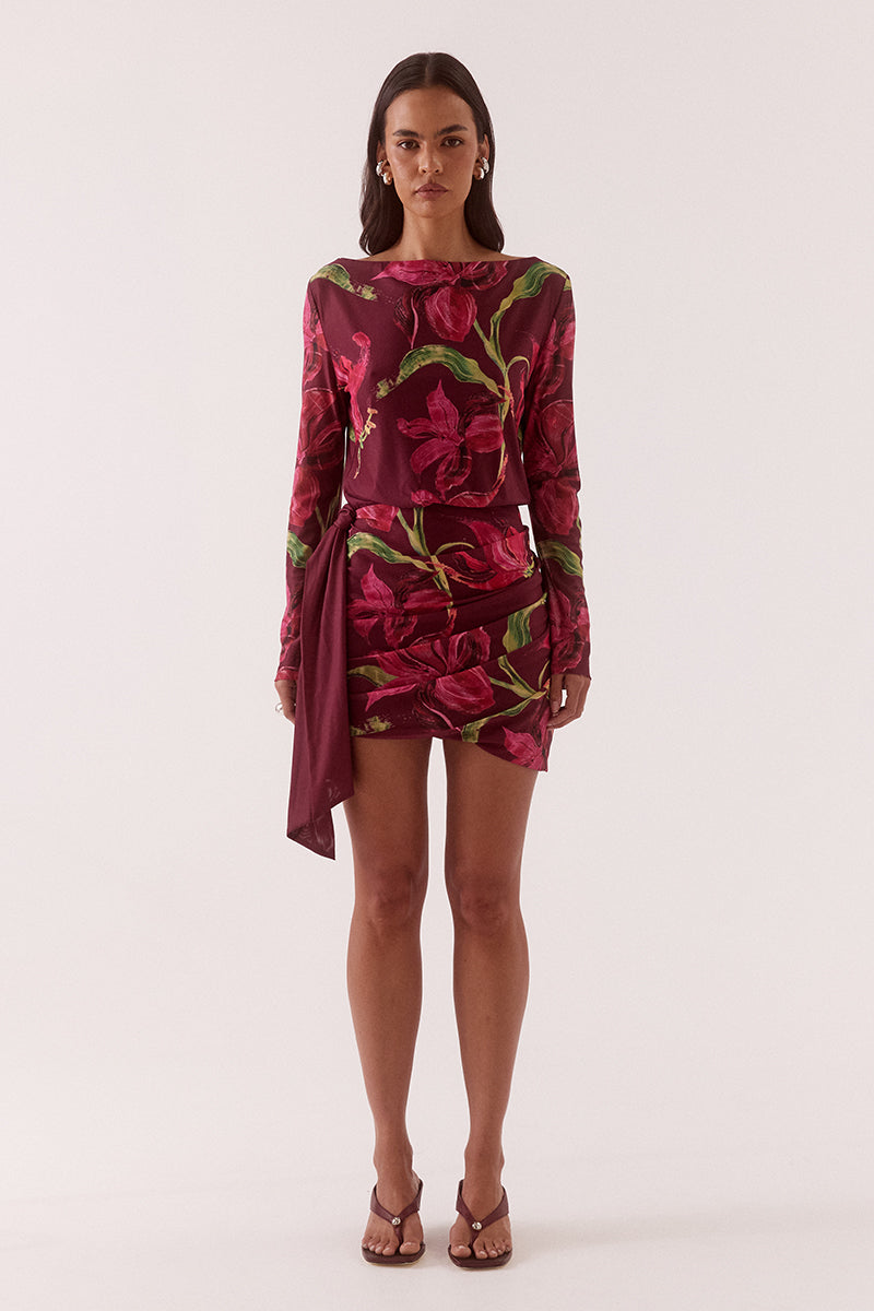 Women’s long sleeve stretch mesh mini dress with boat neckline, draped skirt, elastic waist and removable belt in exclusive print