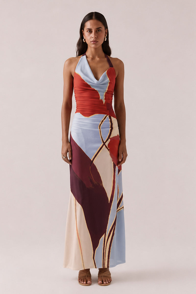 Fitted halter neck maxi dress in stretch mesh with exclusive placement print, asymmetric cowl neckline, side gathers, left leg split and invisible side zipper, worn by model in size 8.
