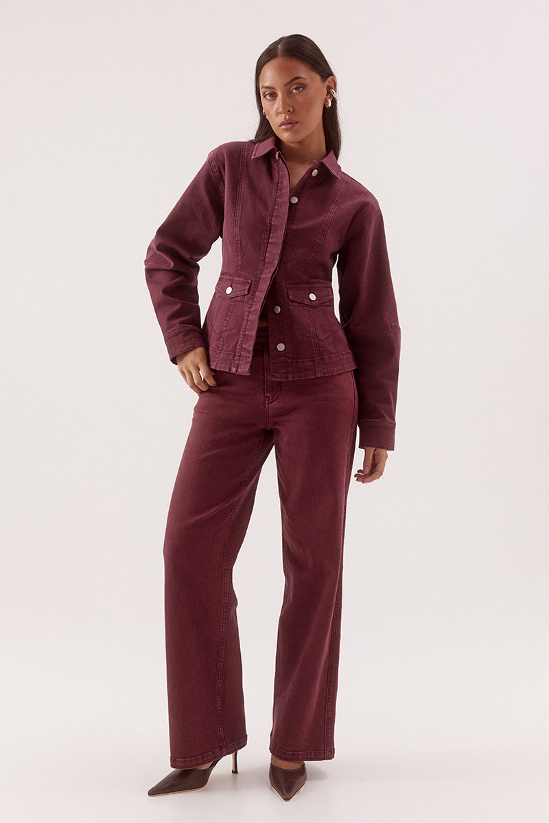 Women's fitted cotton blend denim jacket with a two-piece collar, concealed front button placket, princess seams, and flap pockets.
