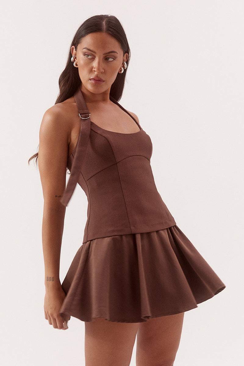 Black halter neck mini dress with adjustable strap, silver D ring detail, shaped bodice and soft gathered Lyocell skirt