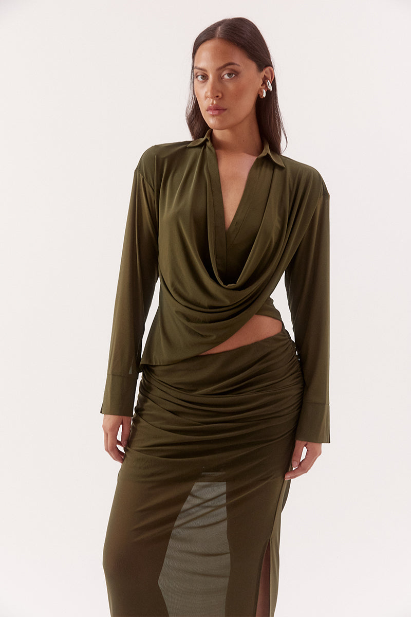 Women's stretch mesh drape front shirt with cowl wrap neckline, dropped shoulders, two-piece collar and wide split cuffs.