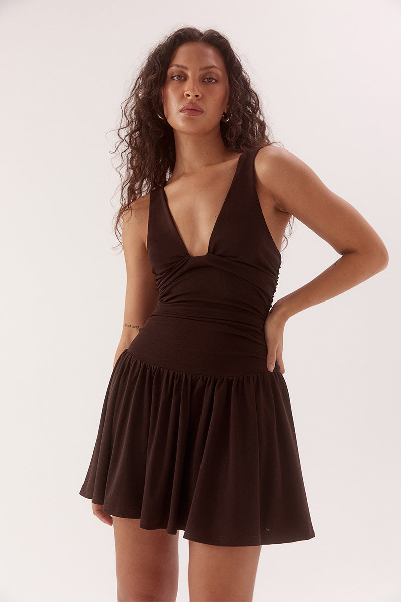 Dropped waist mini dress in textured rib mesh with scoop neckline and gathered skirt