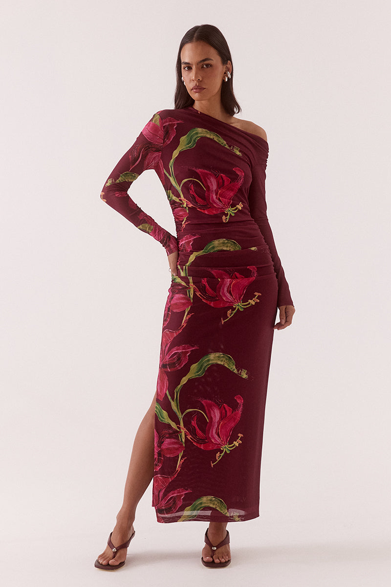 Women’s off-shoulder stretch mesh maxi dress with asymmetric high neck, long sleeves, gathered waist and side split in exclusive print