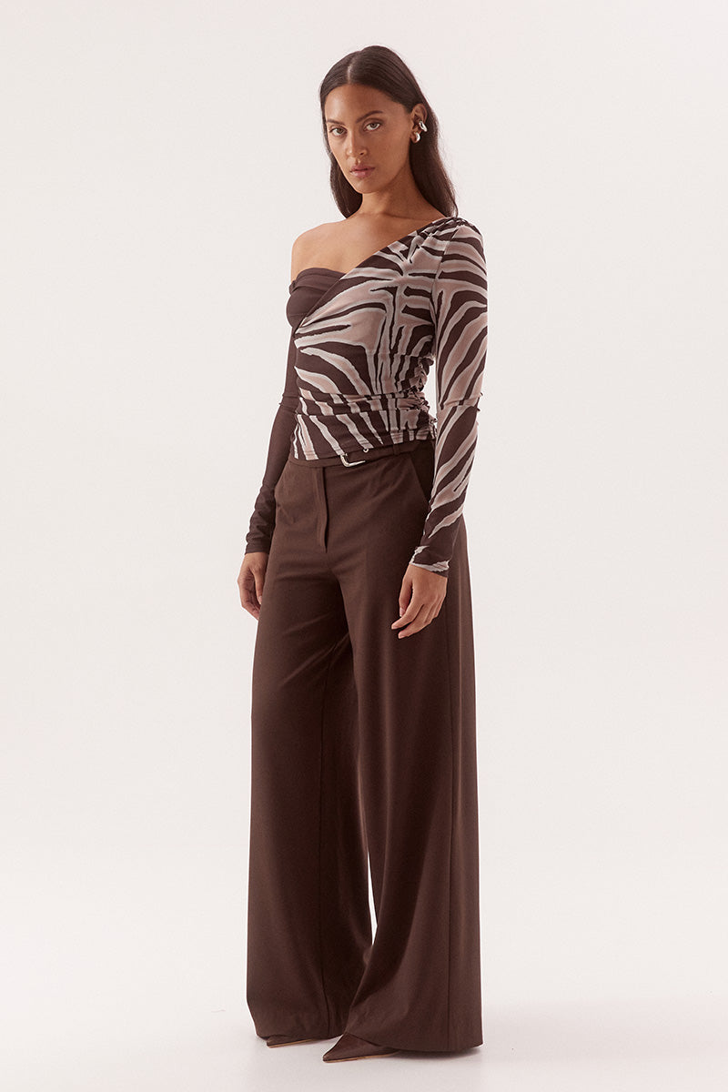 Women's fitted stretch mesh long sleeve top in exclusive print with asymmetric off-shoulder neckline, ruching detail, and body-lined finish.