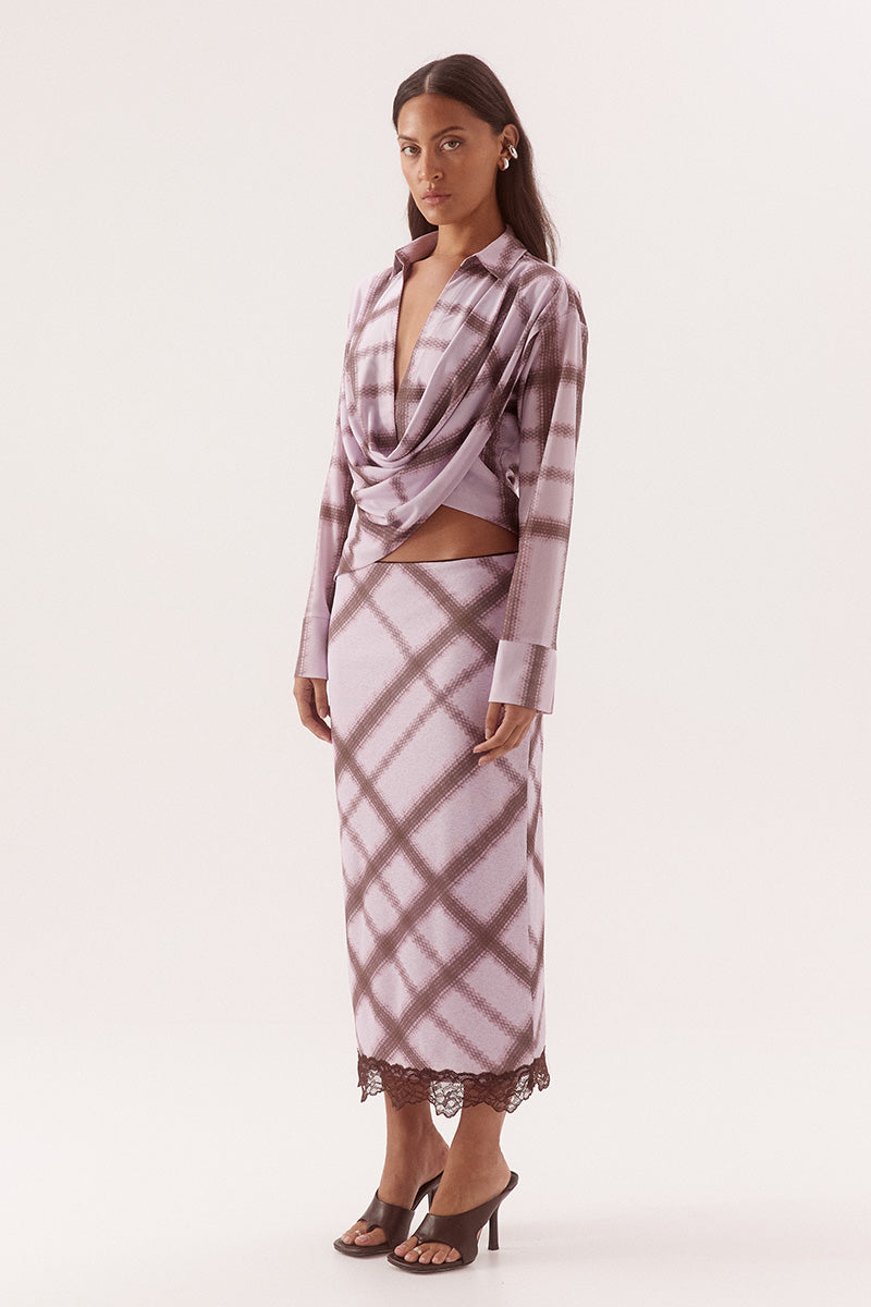 Women's textured stretch mesh drape front shirt with exclusive print, cowl wrap neckline, dropped shoulders and wide split cuffs.
