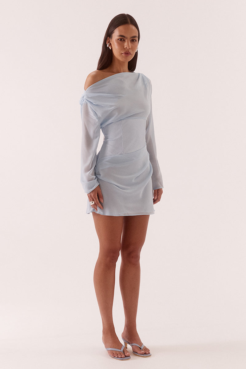 Women’s A-line mini dress with chiffon bodice, textured stretch waistband, draped overlayer skirt, boat neck neckline, long sleeves, and side zip closure.