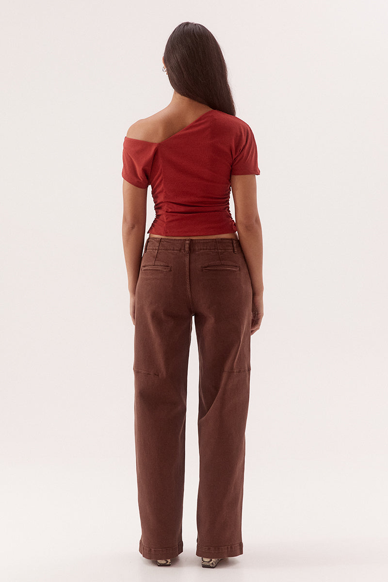 Textured mesh off shoulder top with asymmetric neckline, gathered waist, short sleeves and versatile shoulder styling