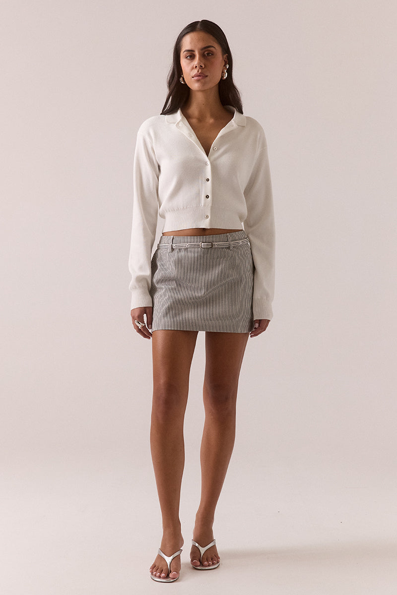 Striped mini skort with double-tiered belt loops and silver metal buckle detail