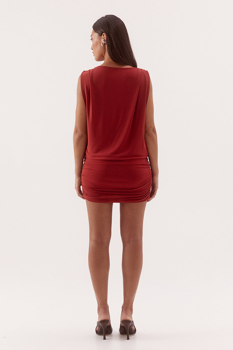 Women's stretch mesh sleeveless mini dress with sheer tank bodice, gathered skirt, boat neckline, built-in bralette and suede belt.