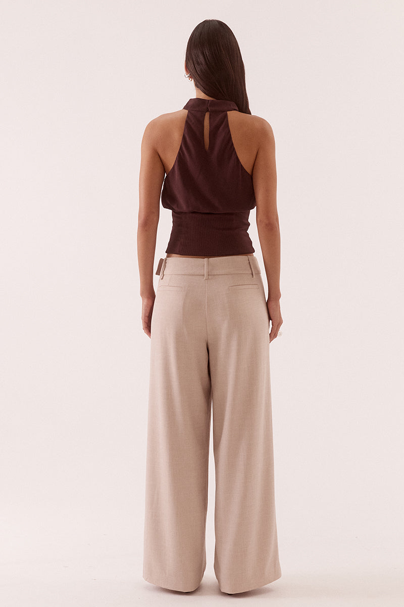 Women’s high cowl neck top with chiffon upper, textured stretch waistband, soft gathers at bust, back keyhole detail, and side zip closure.