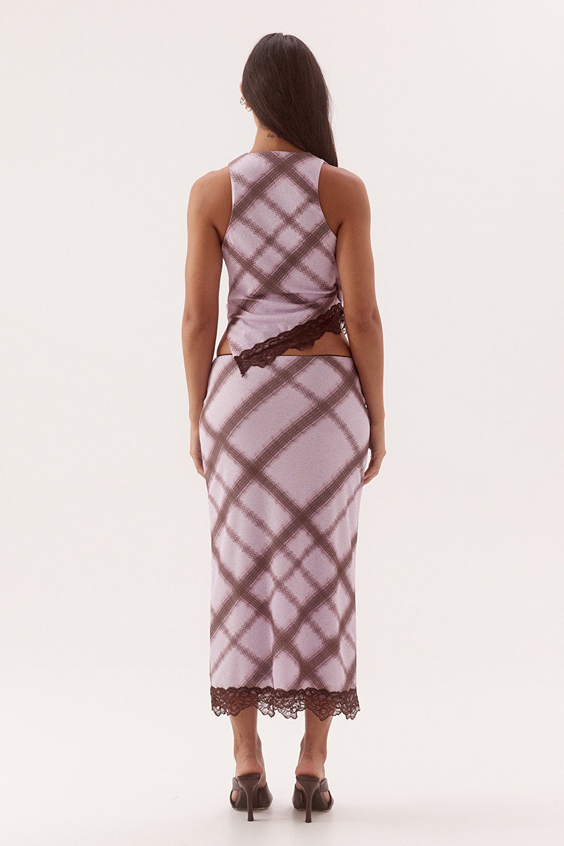 Women's exclusive print textured stretch mesh sleeveless wrap top with gathered sides, asymmetric lace-trim hem and pull-on design.