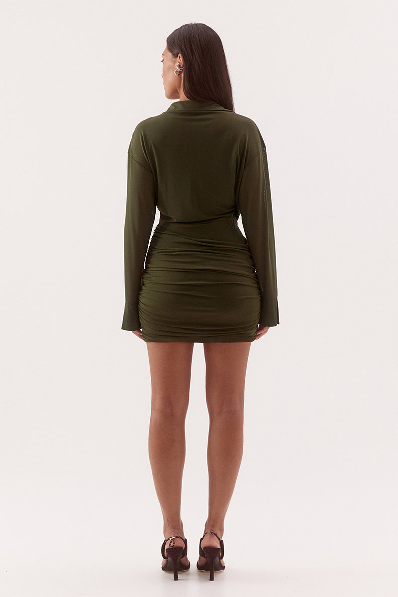 Women's stretch mesh drape front mini dress with cowl wrap neckline, dropped shoulders, gathered skirt overlay and split cuffs.