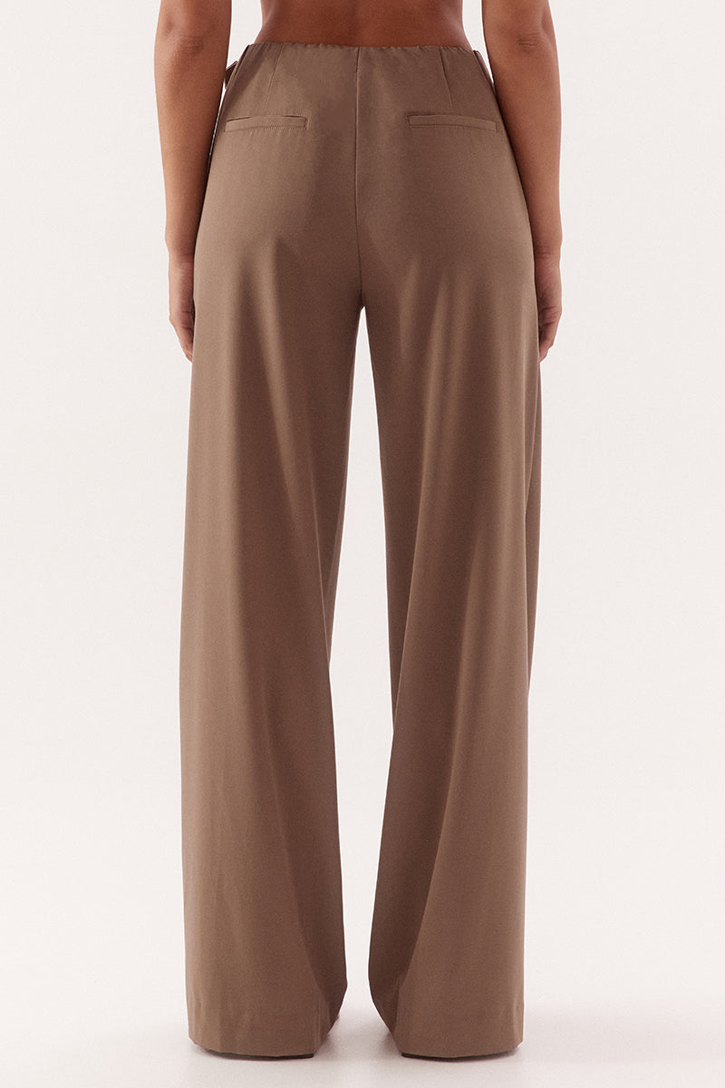 Women's mid-rise straight leg pants in a bamboo blend fabric with a relaxed fit, buckle waist detail, elasticated back waist, and functional pockets.