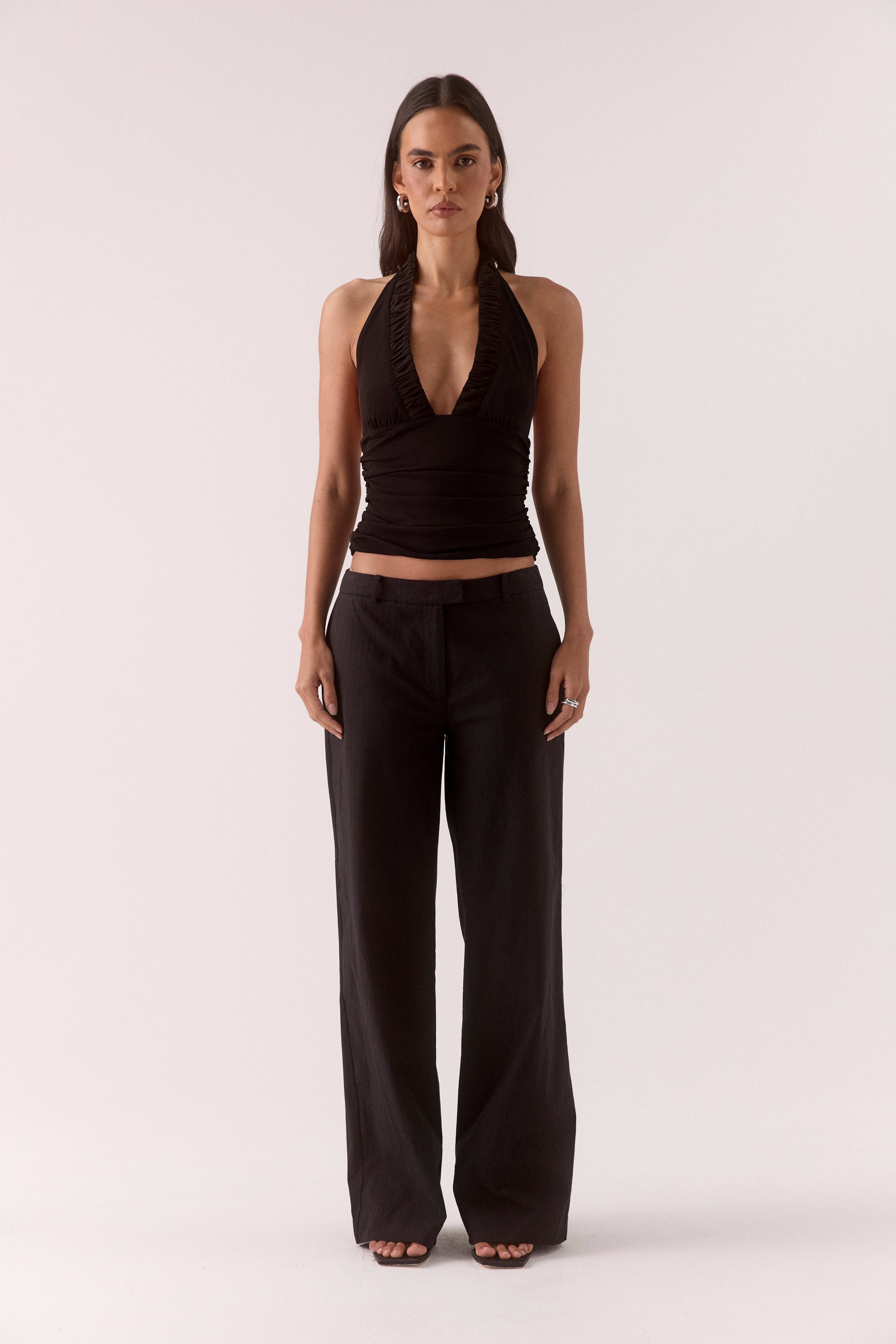 Women’s textured stretch mesh empire halter neck top with gathered side detailing, back neck tie, elasticated back and flattering fitted silhouette.