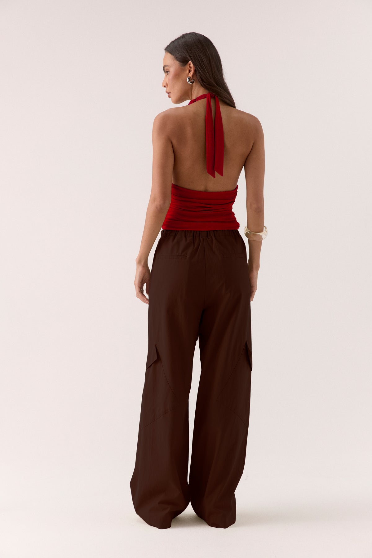 Women’s textured stretch mesh empire halter neck top with gathered side detailing, back neck tie, elasticated back and flattering fitted silhouette.