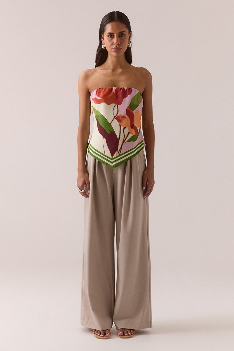 Strapless crepe top with exclusive placement print, V-shaped hemline, elasticated top edge, functional back ties and invisible side zipper, worn by model in size 8.