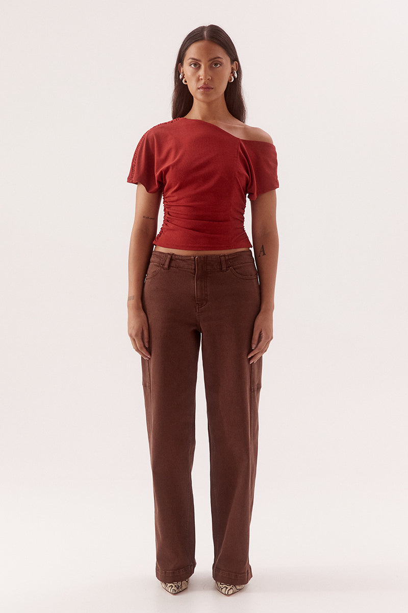 Textured mesh off shoulder top with asymmetric neckline, gathered waist, short sleeves and versatile shoulder styling