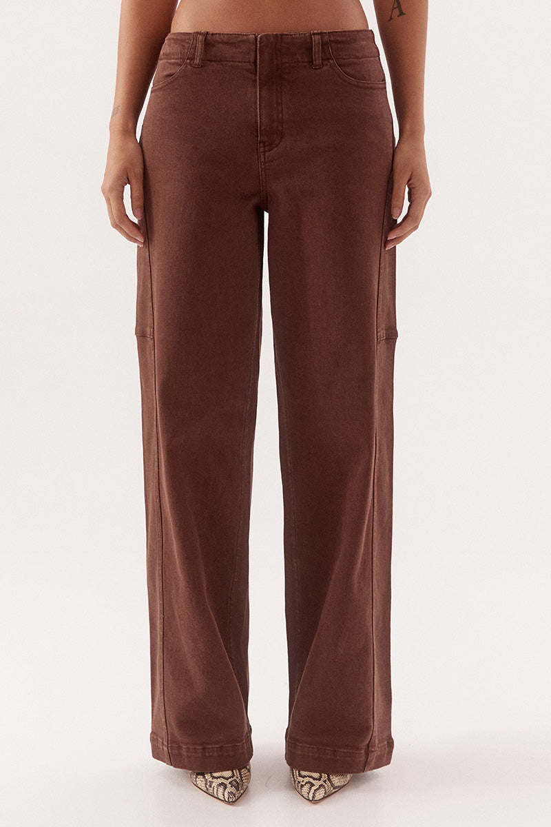 Women's cotton blend mid-rise straight leg jeans with front curved pockets, back welt pockets, fly front and knee dart detailing.