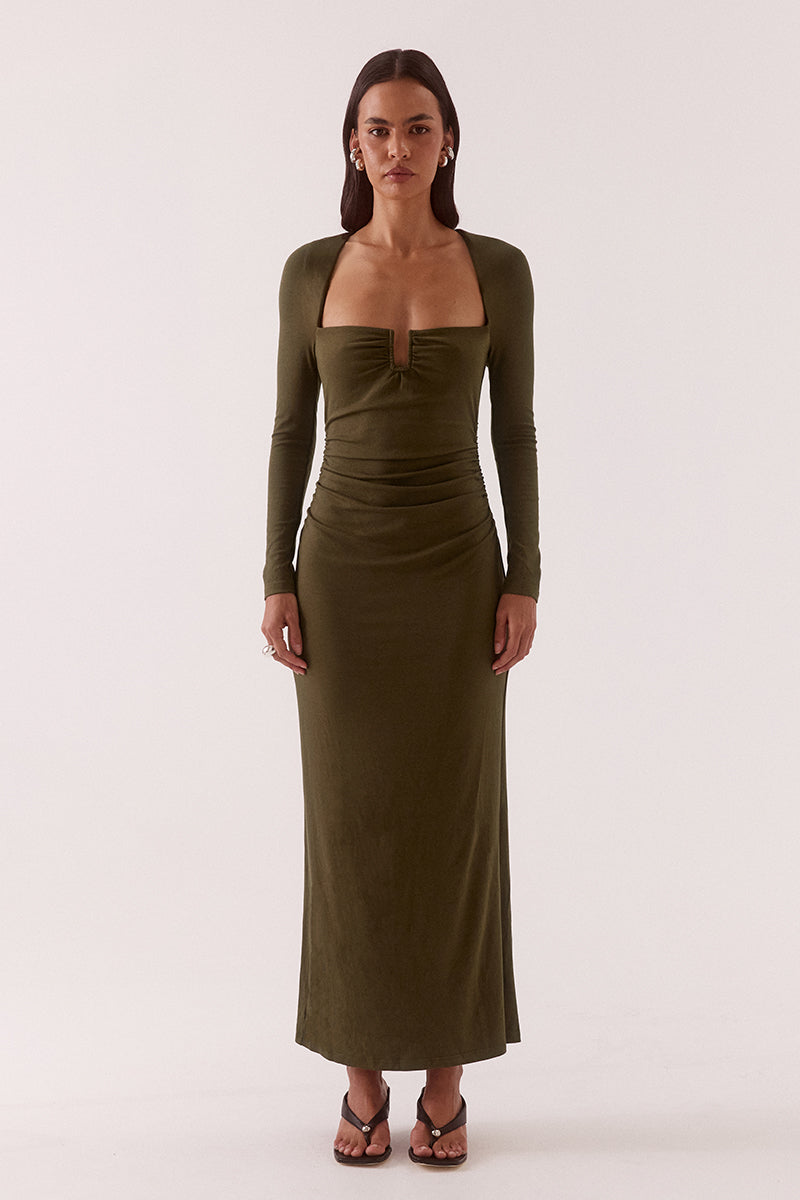 Women’s fitted long sleeve maxi dress in rayon blend with front bust cut-out, wire support, gathered bust and waist, and centre back split