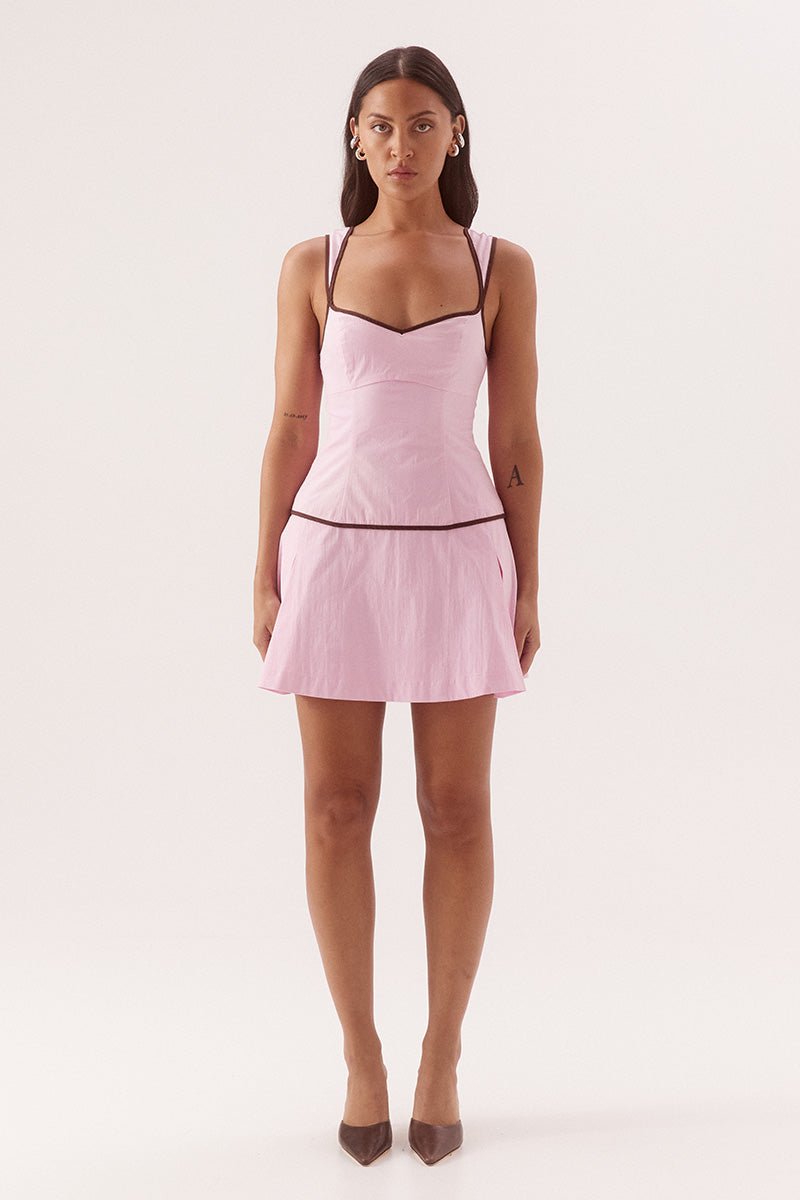 Fitted mini dress in stretch cotton with sweetheart neckline and dropped waist pleats