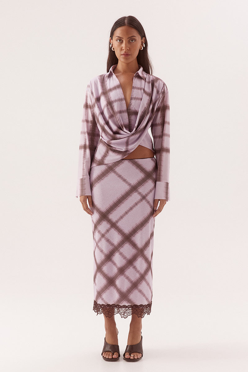 Women's textured stretch mesh drape front shirt with exclusive print, cowl wrap neckline, dropped shoulders and wide split cuffs.