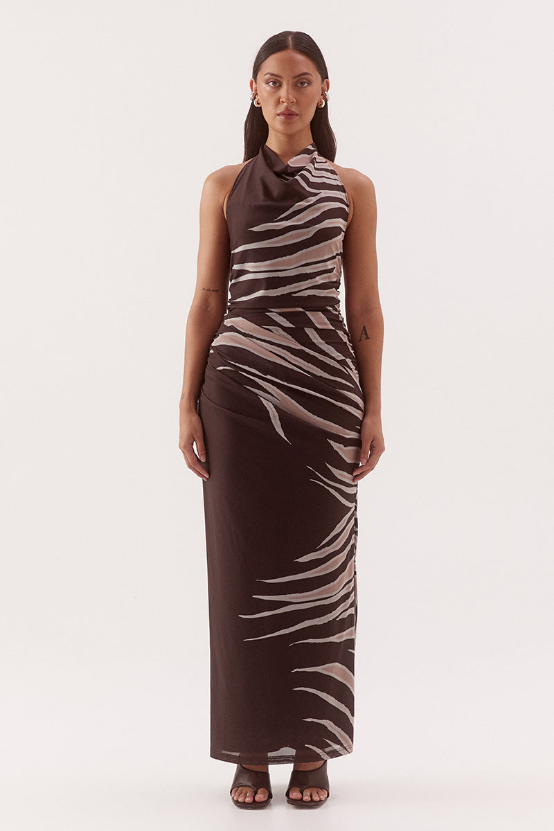 Women's fitted stretch mesh midi dress in exclusive print with a halter cowl neckline, gathered bodice, layered skirt, and side split detail.