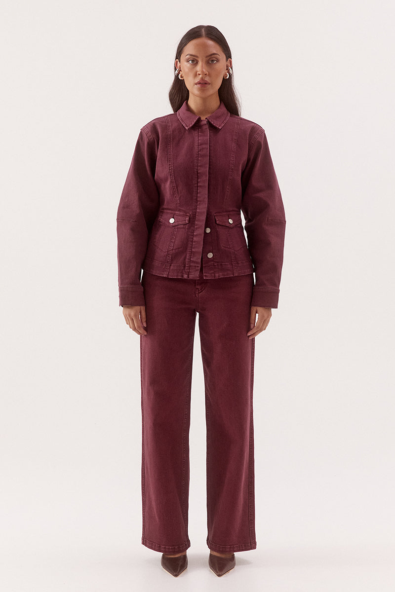 Women's fitted cotton blend denim jacket with a two-piece collar, concealed front button placket, princess seams, and flap pockets.