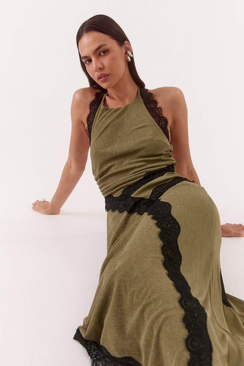 Textured stretch mesh halter midi dress with lace trim, asymmetric hem, gathered waist, and tie-back scoop neckline.