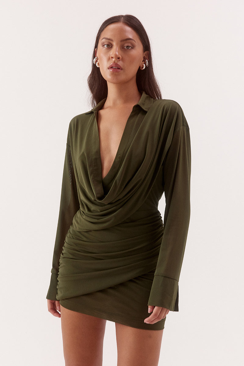Women's stretch mesh drape front mini dress with cowl wrap neckline, dropped shoulders, gathered skirt overlay and split cuffs.