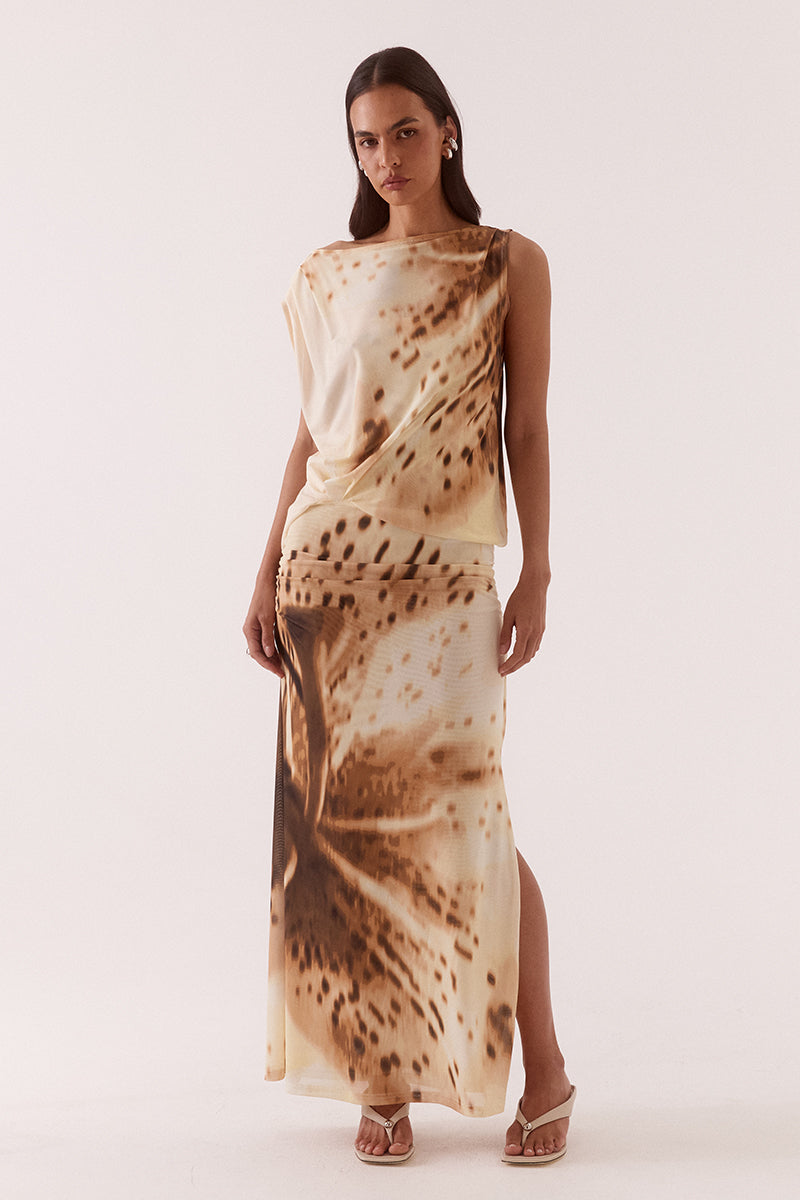 Sleeveless stretch mesh midi dress with exclusive print, multiwear neckline, gathered waist, side split, and built-in bralette. Fully lined.