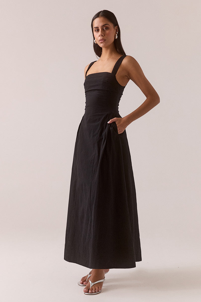 Women’s fit and flare midi dress in stretchy cotton blend with balconette neckline, layered tuck details, curved skirt panels, adjustable wide straps, and hidden side pockets.