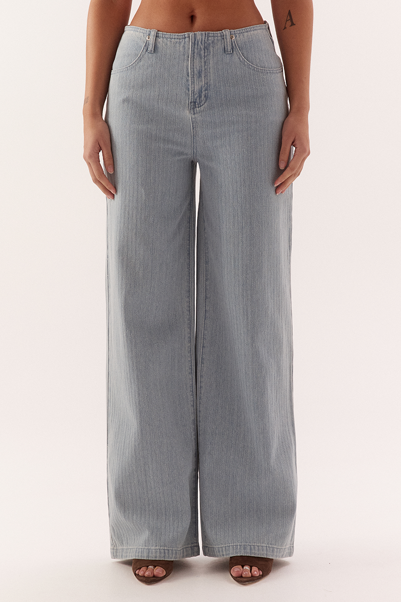 Mid-rise straight leg jeans in cotton with curved front pockets and back yok