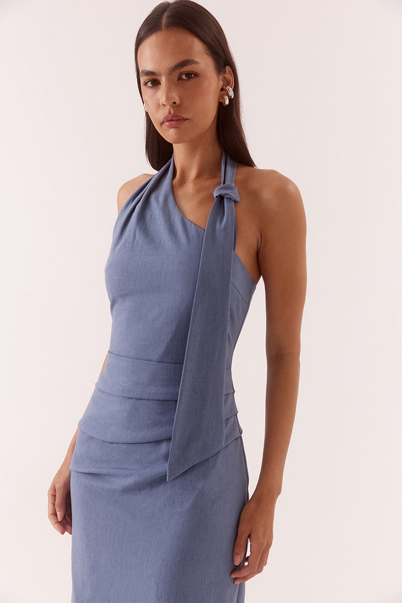Women’s halter neck midi dress in stretch rayon blend with asymmetric neckline, sash detail, column skirt, back split, and zip closure.