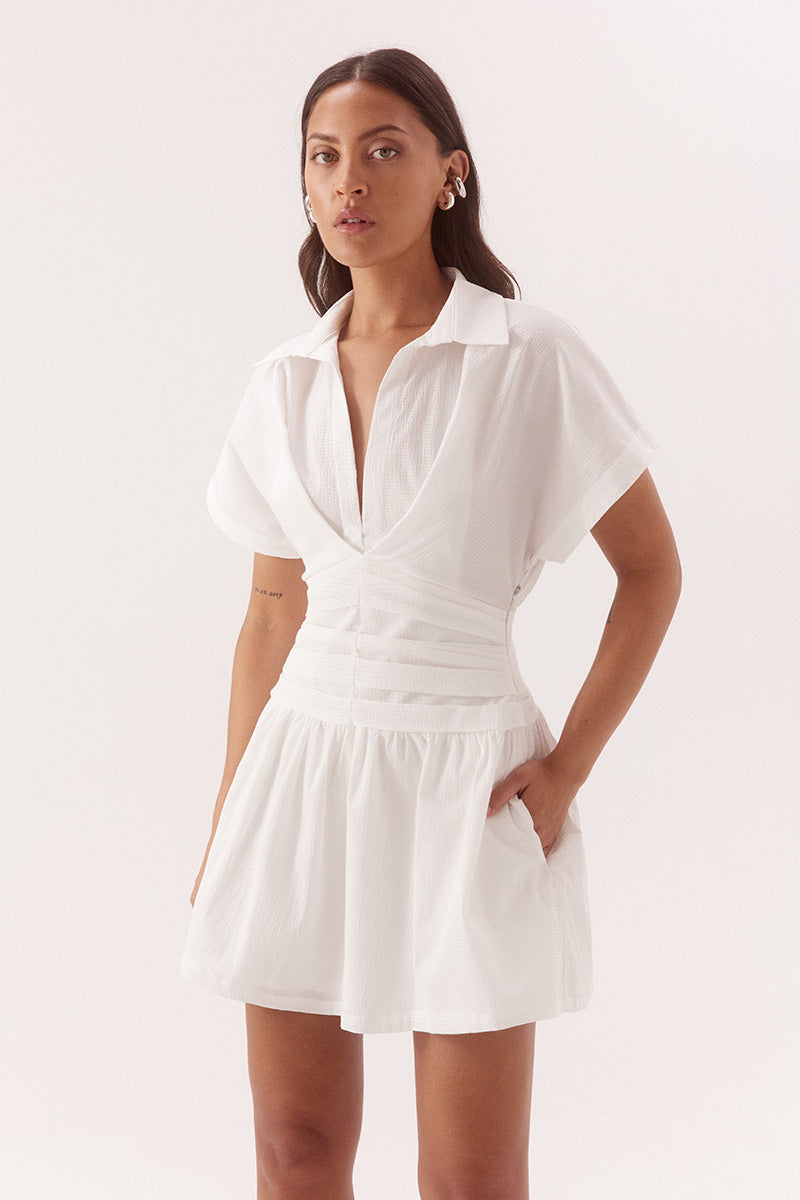 Pleated mini dress in stretch cotton with two piece collar and gathered full skirt