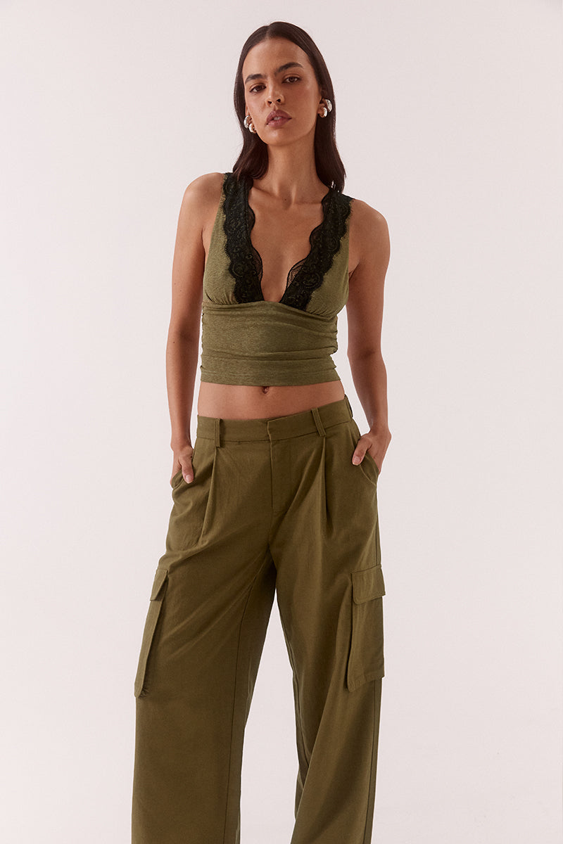 Women’s faux suede bomber jacket with long sleeves, dropped shoulders, zip front closure and elasticated hem