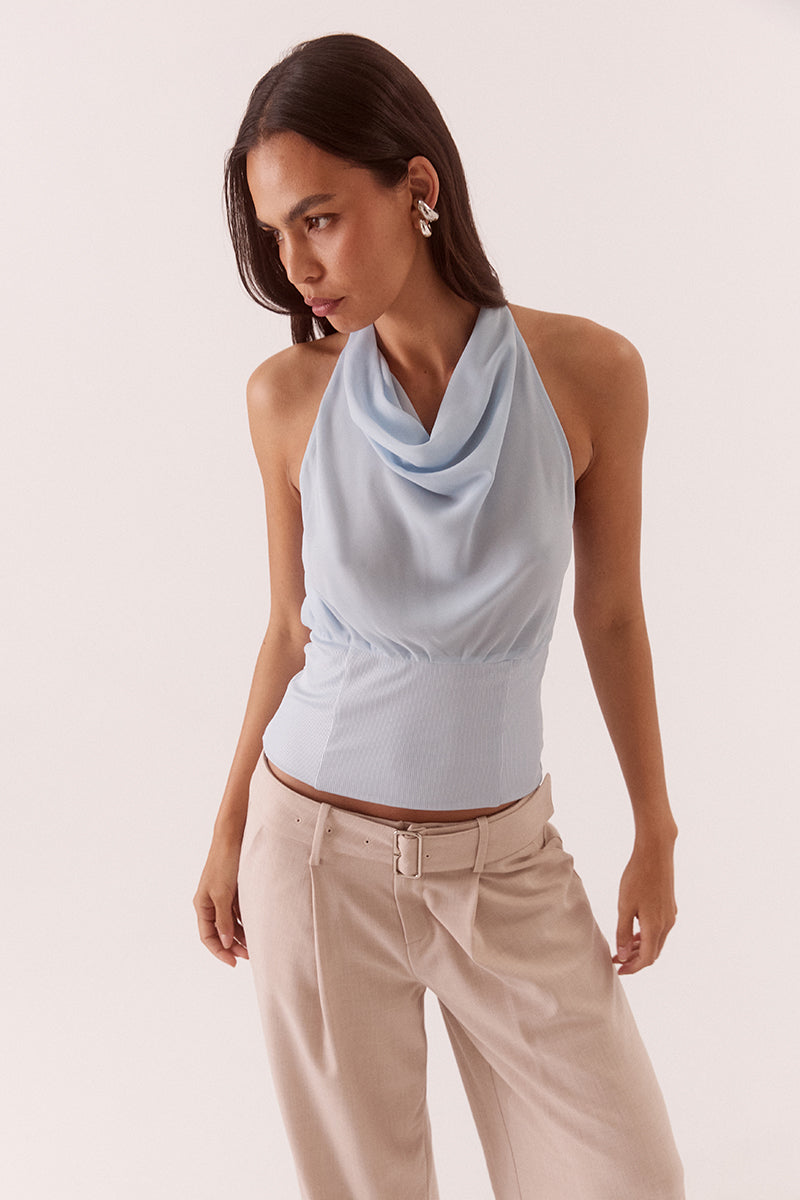 Women’s high cowl neck top with chiffon upper, textured stretch waistband, soft gathers at bust, back keyhole detail, and side zip closure.