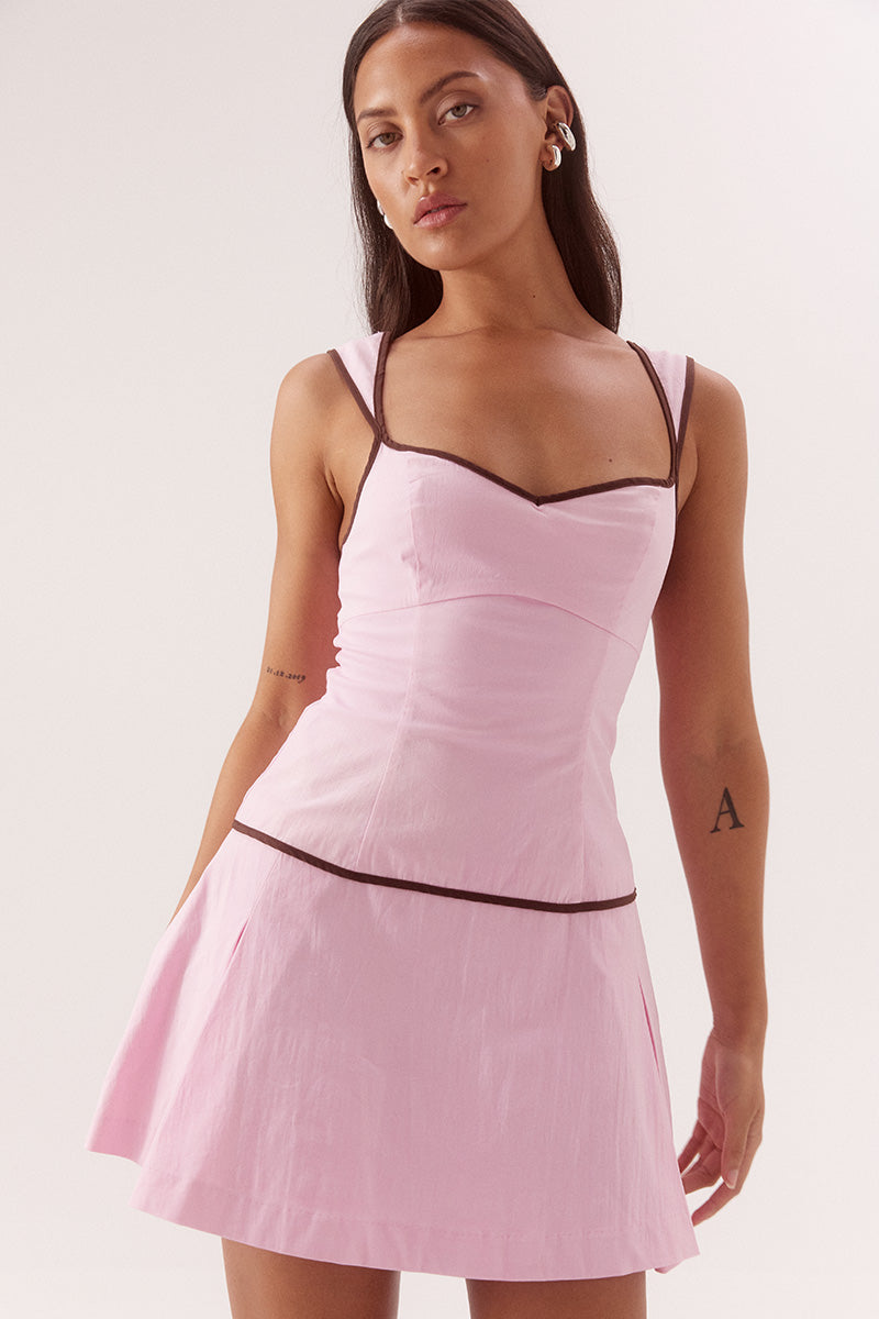 Fitted mini dress in stretch cotton with sweetheart neckline and dropped waist pleats