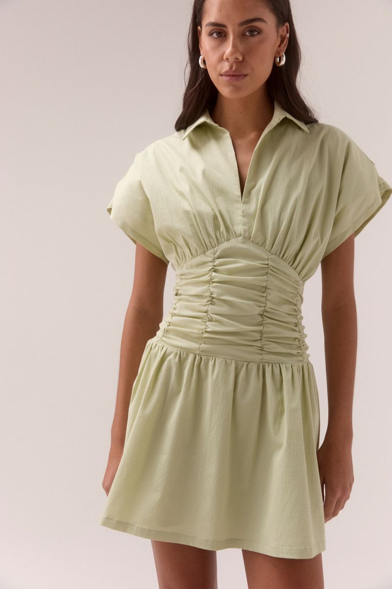 Cotton blend short sleeve mini dress with ruched waist and full skirt