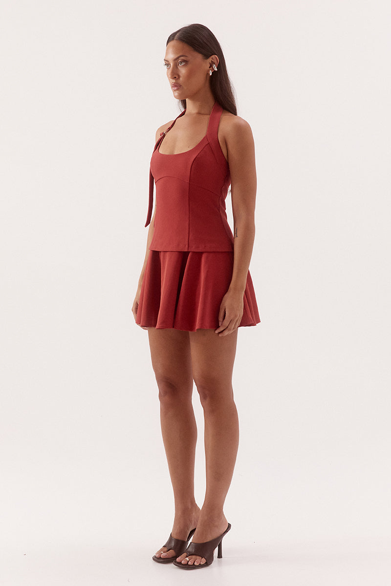 Black halter neck mini dress with adjustable strap, silver D ring detail, shaped bodice and soft gathered Lyocell skirt