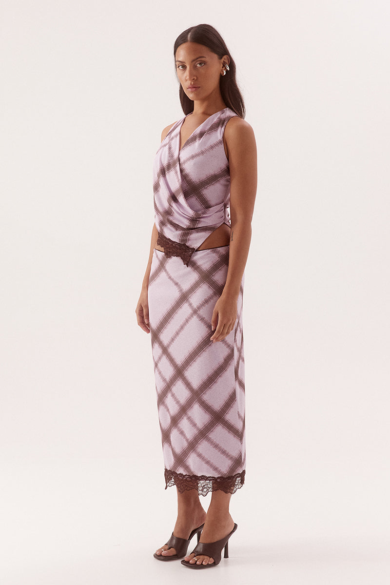 Women's exclusive print textured stretch mesh sleeveless wrap top with gathered sides, asymmetric lace-trim hem and pull-on design.