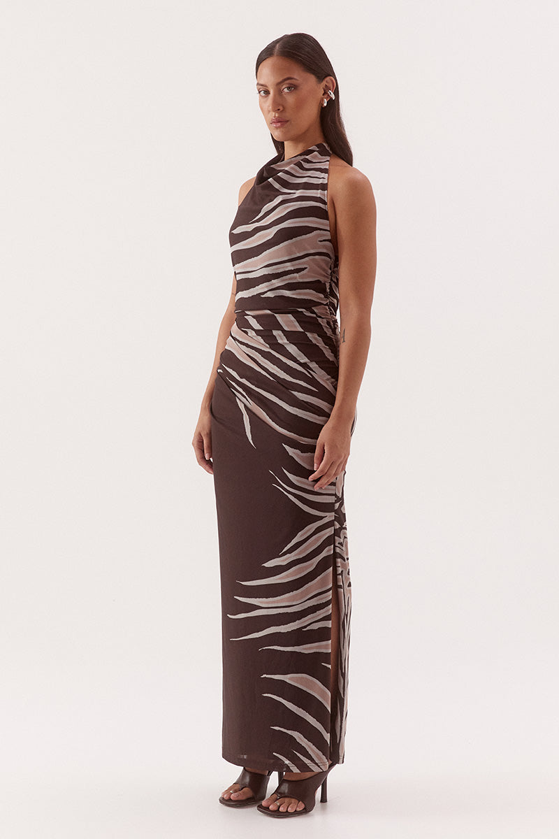 Women's fitted stretch mesh midi dress in exclusive print with a halter cowl neckline, gathered bodice, layered skirt, and side split detail.