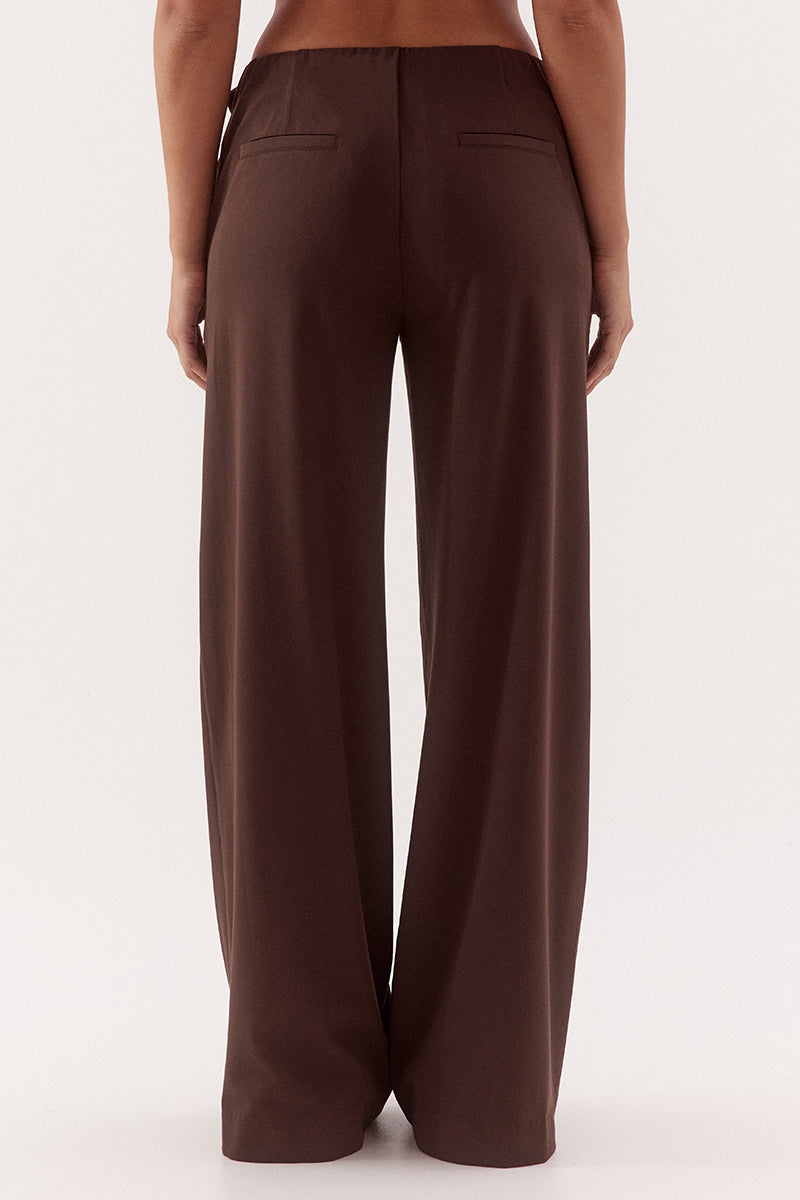 Women's mid-rise straight leg pants in a bamboo blend fabric with a relaxed fit, buckle waist detail, elasticated back waist, and functional pockets.