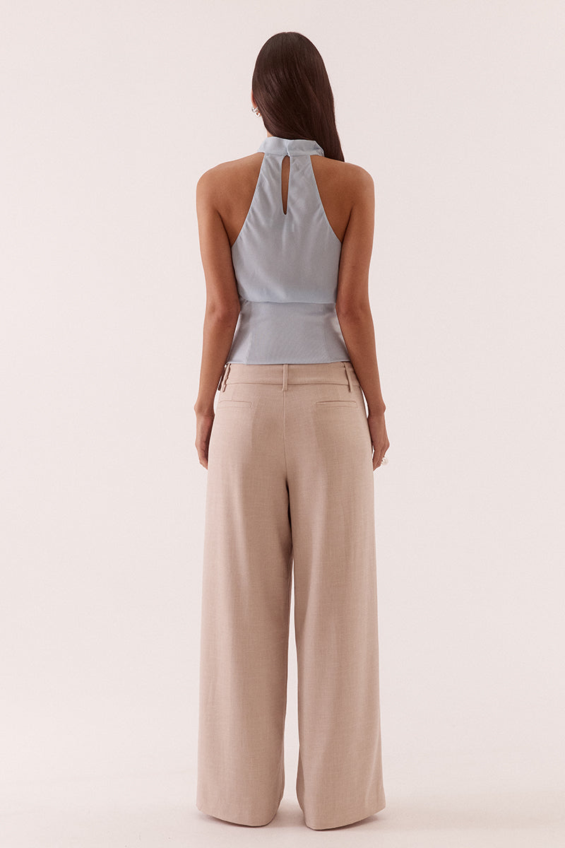 Women’s high cowl neck top with chiffon upper, textured stretch waistband, soft gathers at bust, back keyhole detail, and side zip closure.
