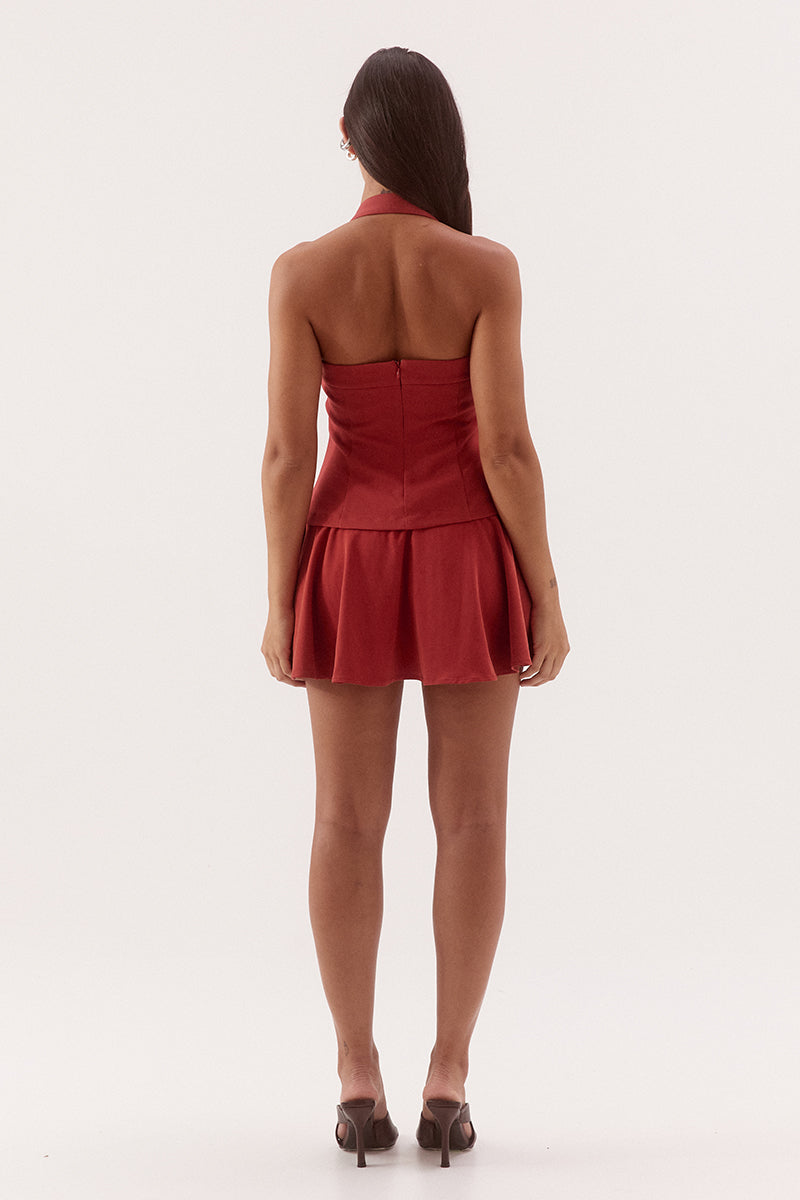 Black halter neck mini dress with adjustable strap, silver D ring detail, shaped bodice and soft gathered Lyocell skirt