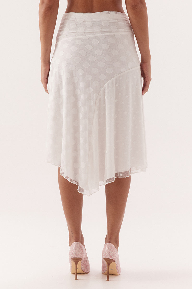 Mid-rise skirt in dot stretch mesh with circle cut side panels and asymmetric hem
