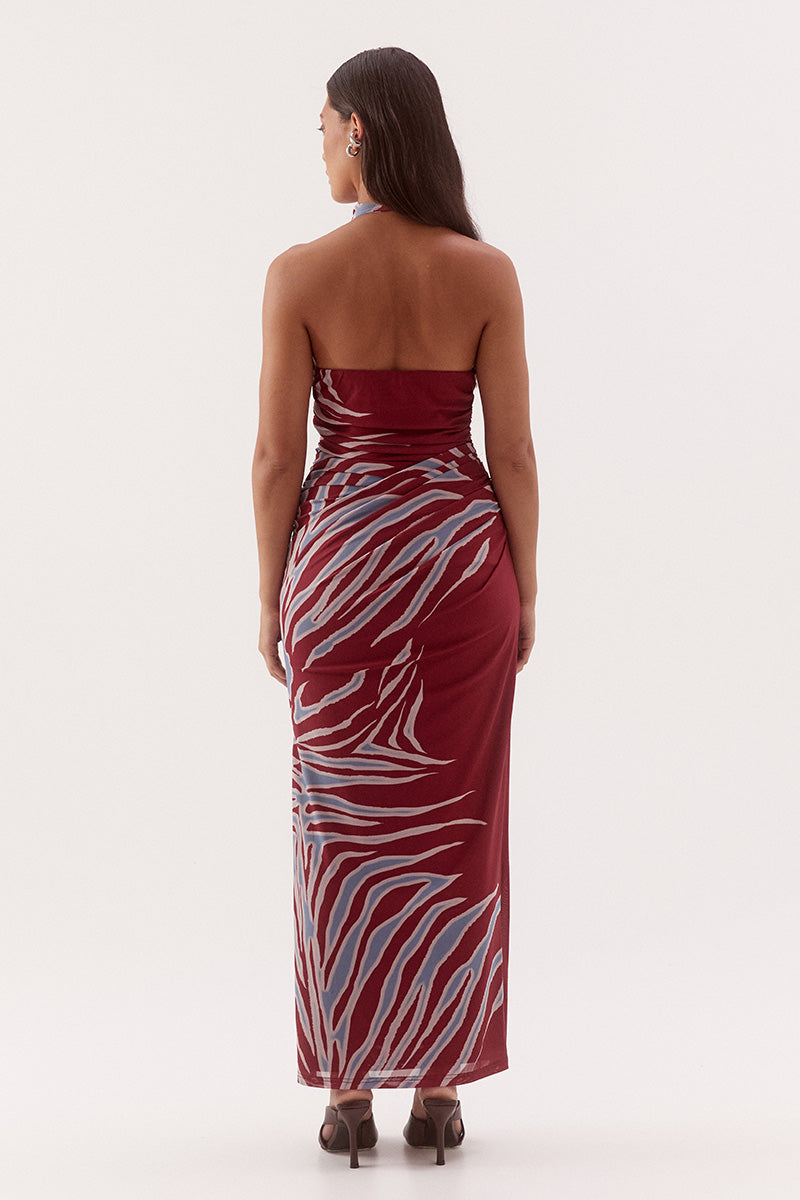 Women's fitted stretch mesh midi dress in exclusive print with a halter cowl neckline, gathered bodice, layered skirt, and side split detail.