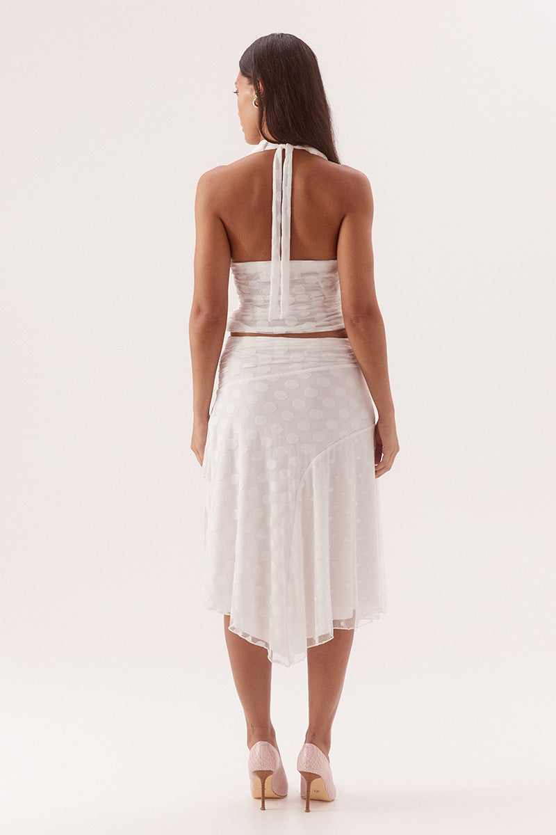 Halter neck empire line top in dot stretch mesh with draped side overlay