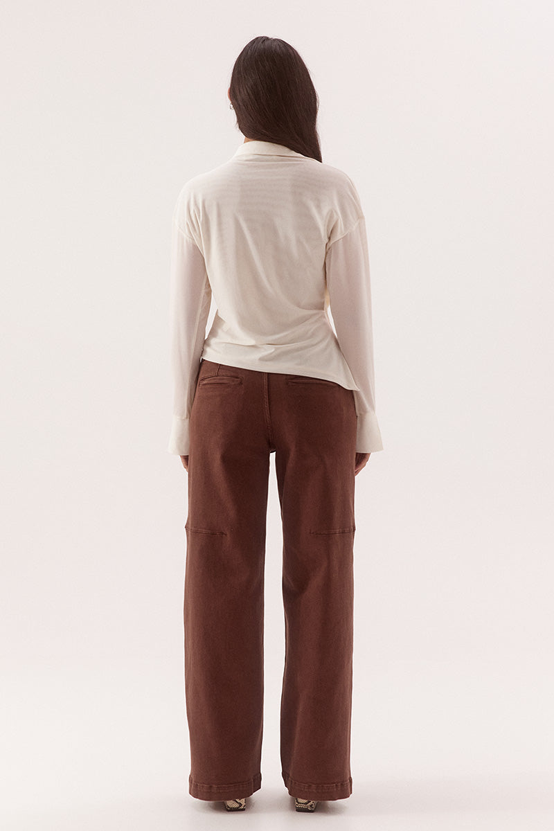 Women's stretch mesh drape front shirt with cowl wrap neckline, dropped shoulders, two-piece collar and wide split cuffs.