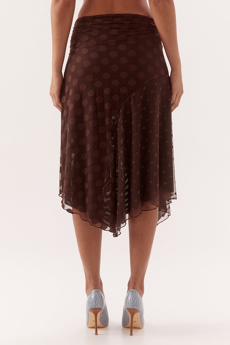 Mid-rise skirt in dot stretch mesh with circle cut side panels and asymmetric hem